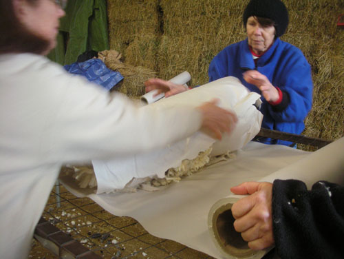 Wrapping the rolled fleece in more paper