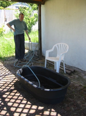 Noel filling the pool